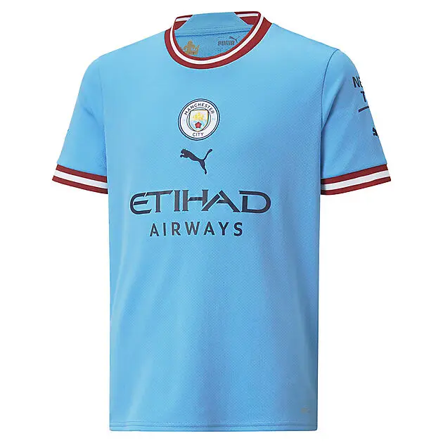 PUMA MCFC Home Jersey Replica Jr 22/23 Team Light Blue-Intense Red Junior
