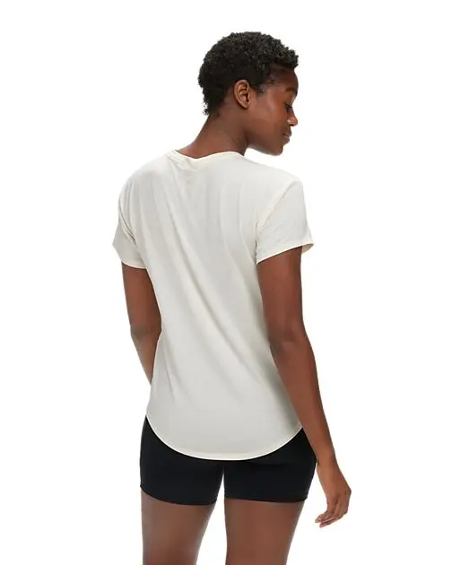 HOKA W HOKA ESSENTIAL TEE EGGNOG Dame | Sport1.no