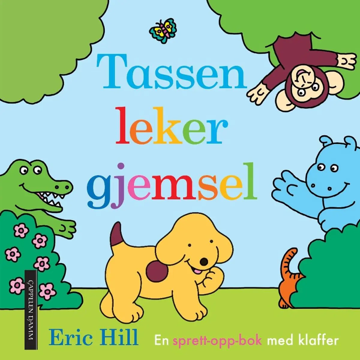 Tassen leker gjemsel: en sprett opp-bok med klaffer