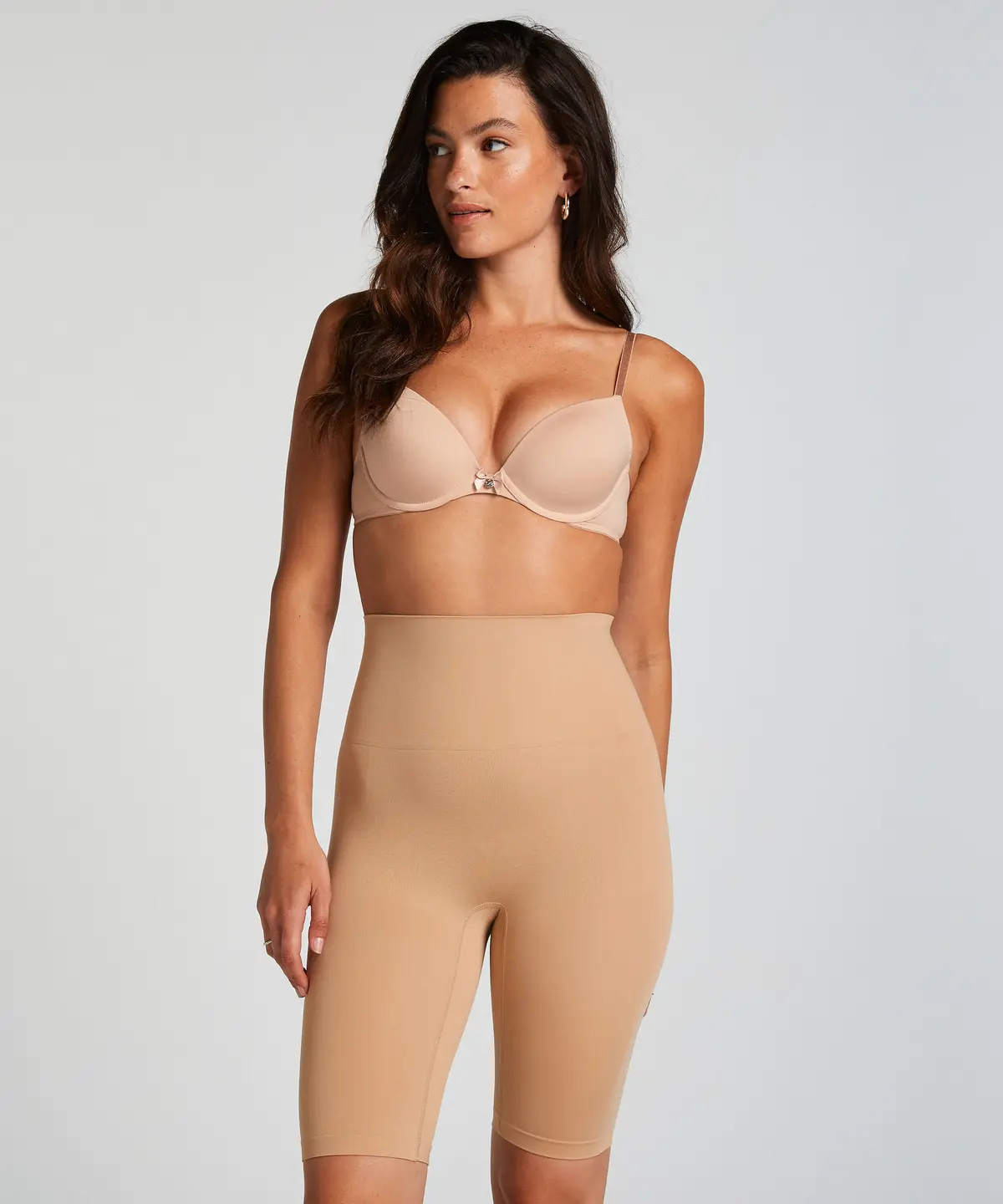 Oppstrammende og slankere bukse - Beige