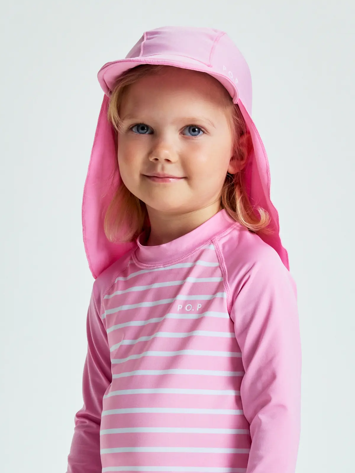 Polarn O. Pyret UV-caps med nakkebeskyttelse - Rosa